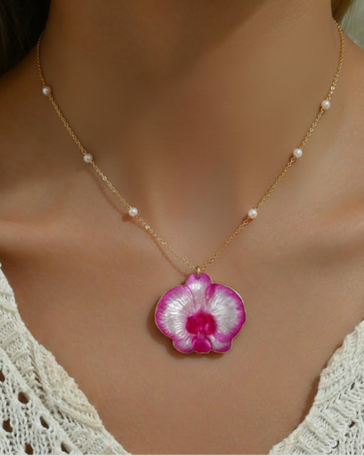 Necklace with a pink orchid pendant on a model