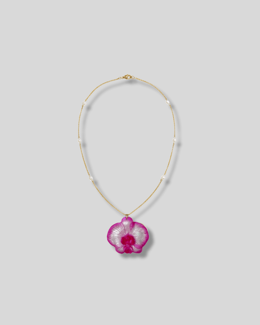 Necklace with a pink orchid pendant 