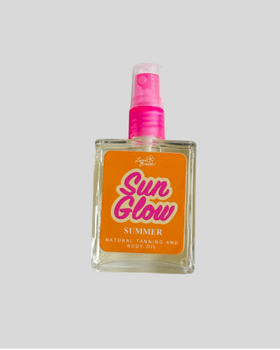Sun Glow summer tanning oil bottle with pink spray nozzle