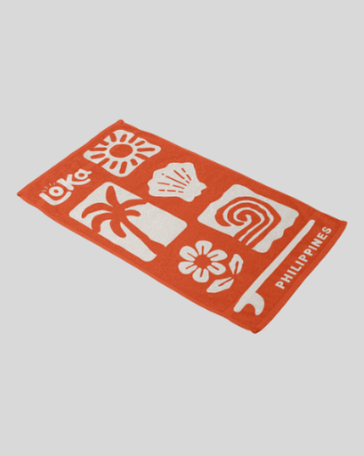 Orange mat with white patterns and 'Loka Philippines' branding 